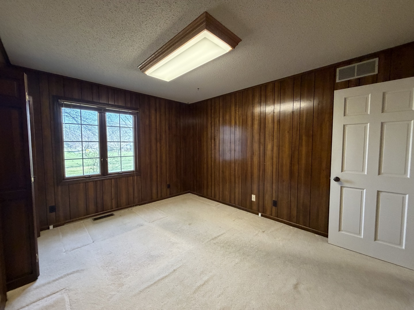 24 South Country Club Road Mattoon, IL 61938 - Photo 48 of 62 a view of an empty room with a window