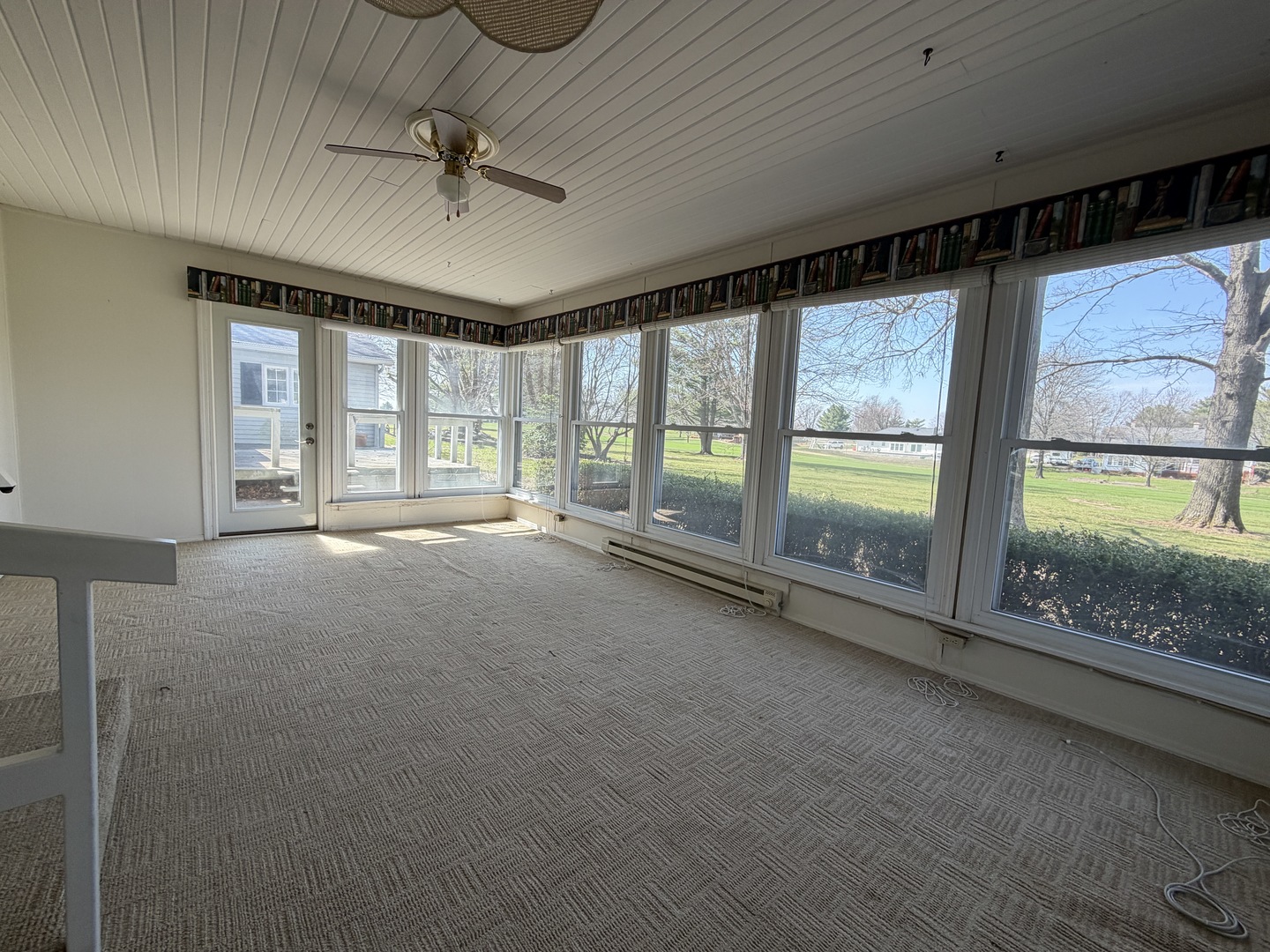 24 South Country Club Road Mattoon, IL 61938 - Photo 50 of 62 a view of an empty room with a fireplace and a large window