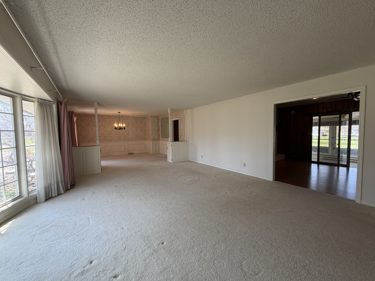 24 South Country Club Road Mattoon, IL 61938 - Photo 7 of 62 a view of an empty room with glass door
