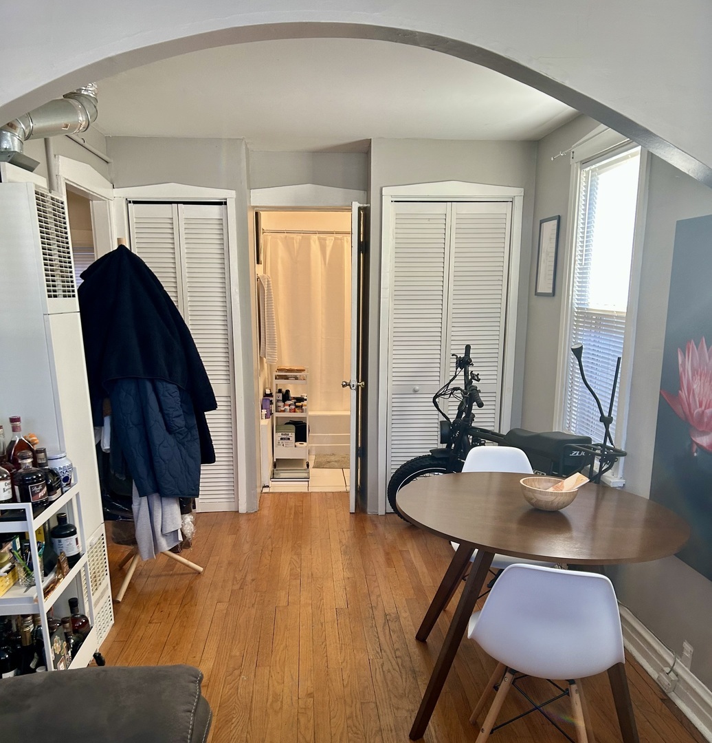 7723 Adams Street Forest Park, IL 60130 - Photo 2 of 7 a dining room with furniture and wooden floor