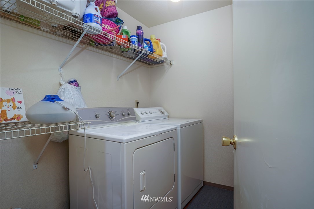 726 Roe Street Steilacoom, WA 98388 - Photo 19 of 29 a utility room with dryer and washer