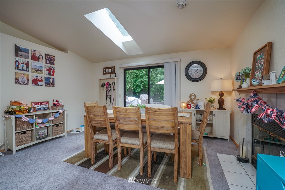 726 Roe Street Steilacoom, WA 98388 - Photo 22 of 29 a dining room with furniture and a window