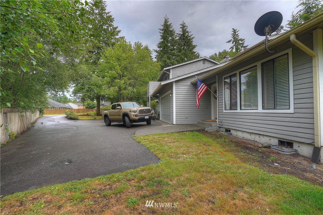 726 Roe Street Steilacoom, WA 98388 - Photo 5 of 29 a view of a house with a patio