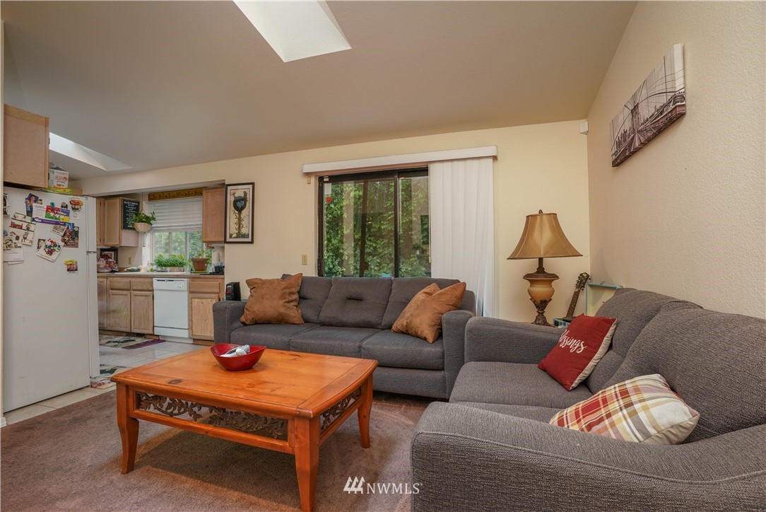 726 Roe Street Steilacoom, WA 98388 - Photo 10 of 29 a living room with furniture and a window