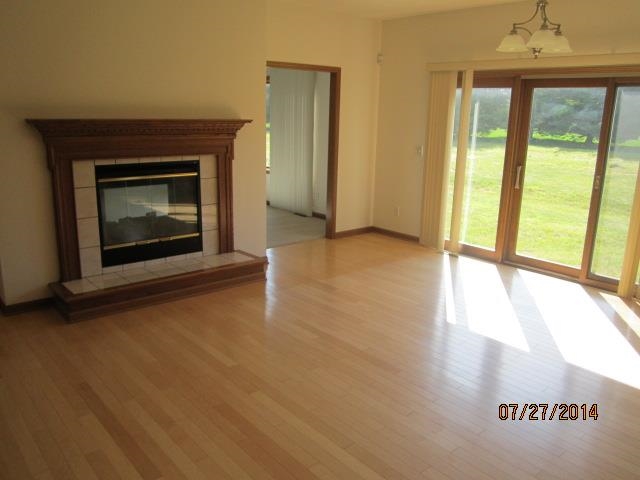 11545 Prestwick Road Belvidere, IL 61008 - Photo 3 of 14 a view of an empty room and window