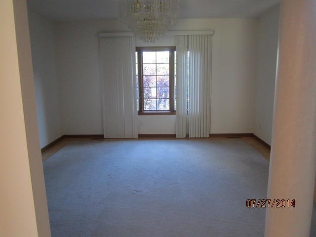 11545 Prestwick Road Belvidere, IL 61008 - Photo 5 of 14 an empty room with a window