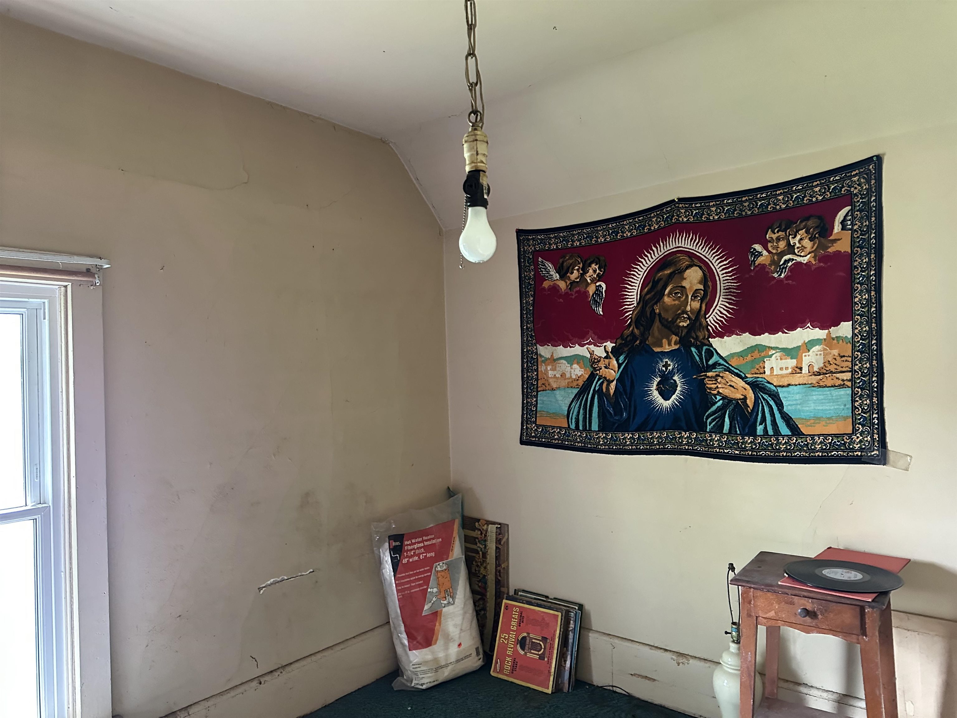 206 Viaduct Road Savanna, IL 61074 - Photo 11 of 14 a view of a hallway with painting on wall and a wall painting