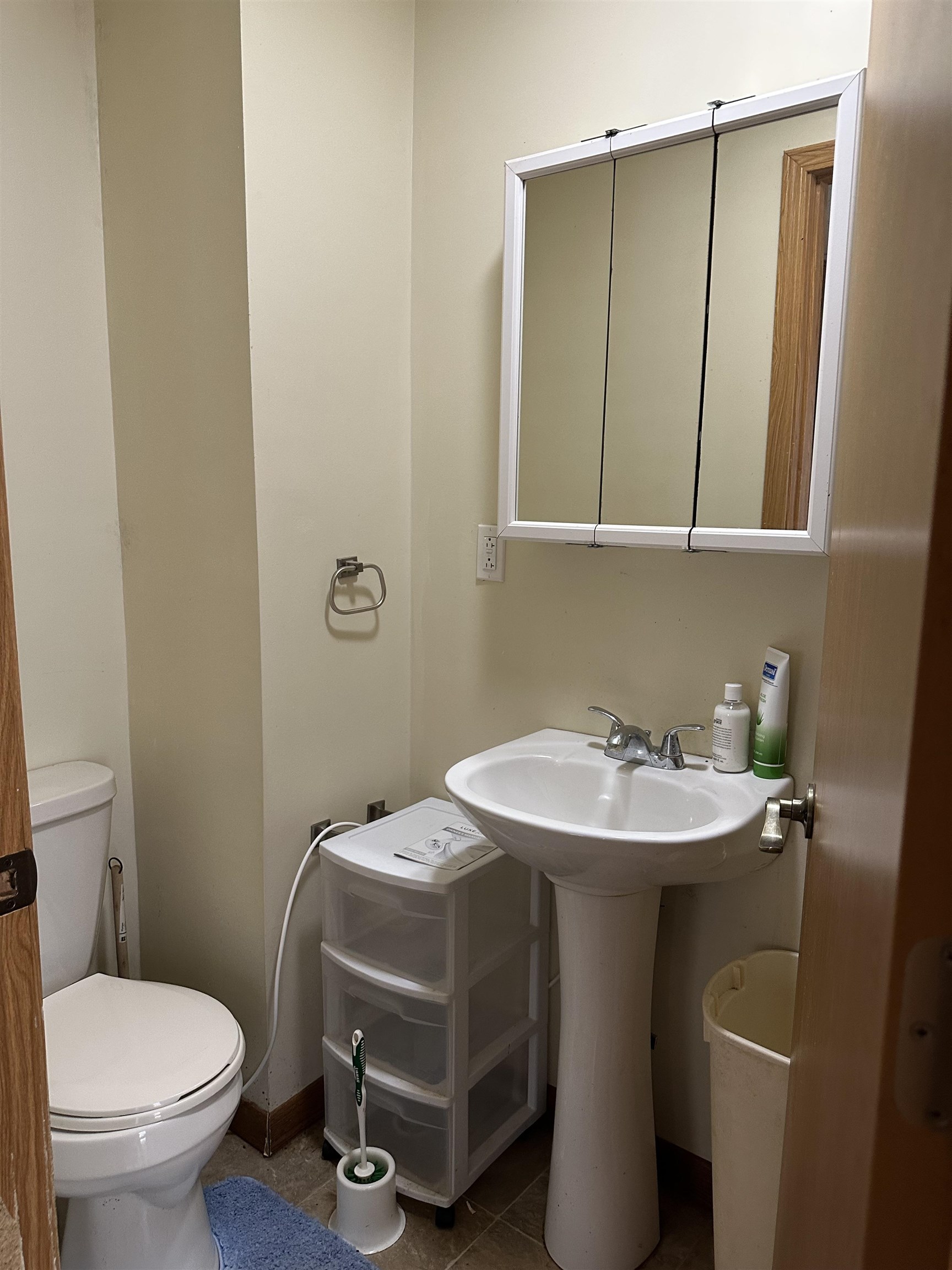 206 Viaduct Road Savanna, IL 61074 - Photo 5 of 14 a bathroom with a sink toilet and mirror