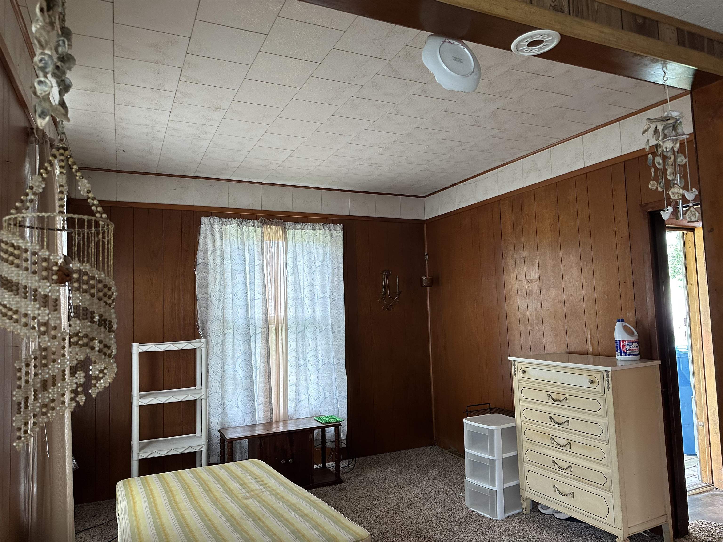 206 Viaduct Road Savanna, IL 61074 - Photo 9 of 14 a bedroom with a bed and a window