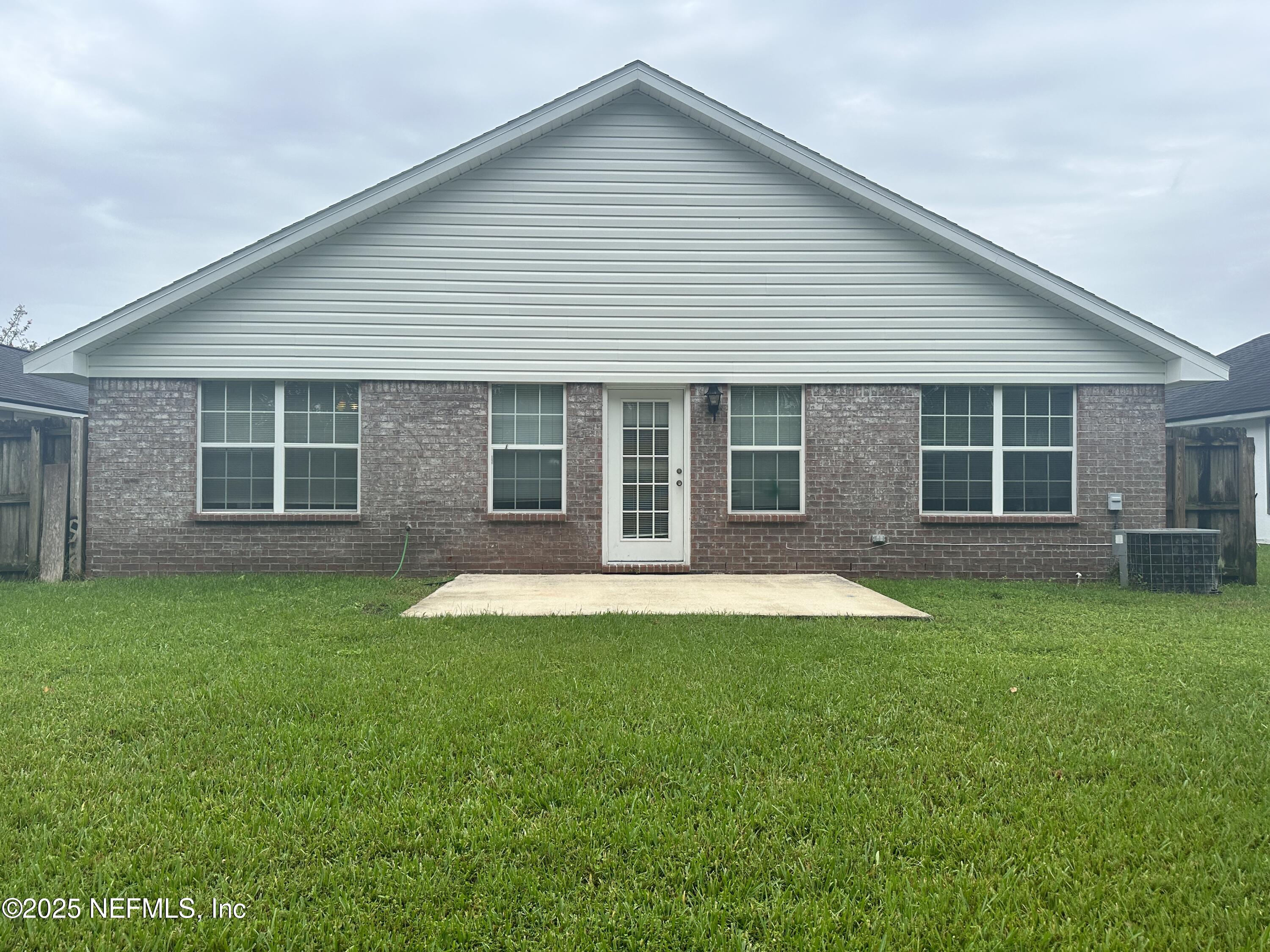 2478 Aloha Lane Middleburg, FL 32068 - Photo 14 of 16 a view of a house with a backyard