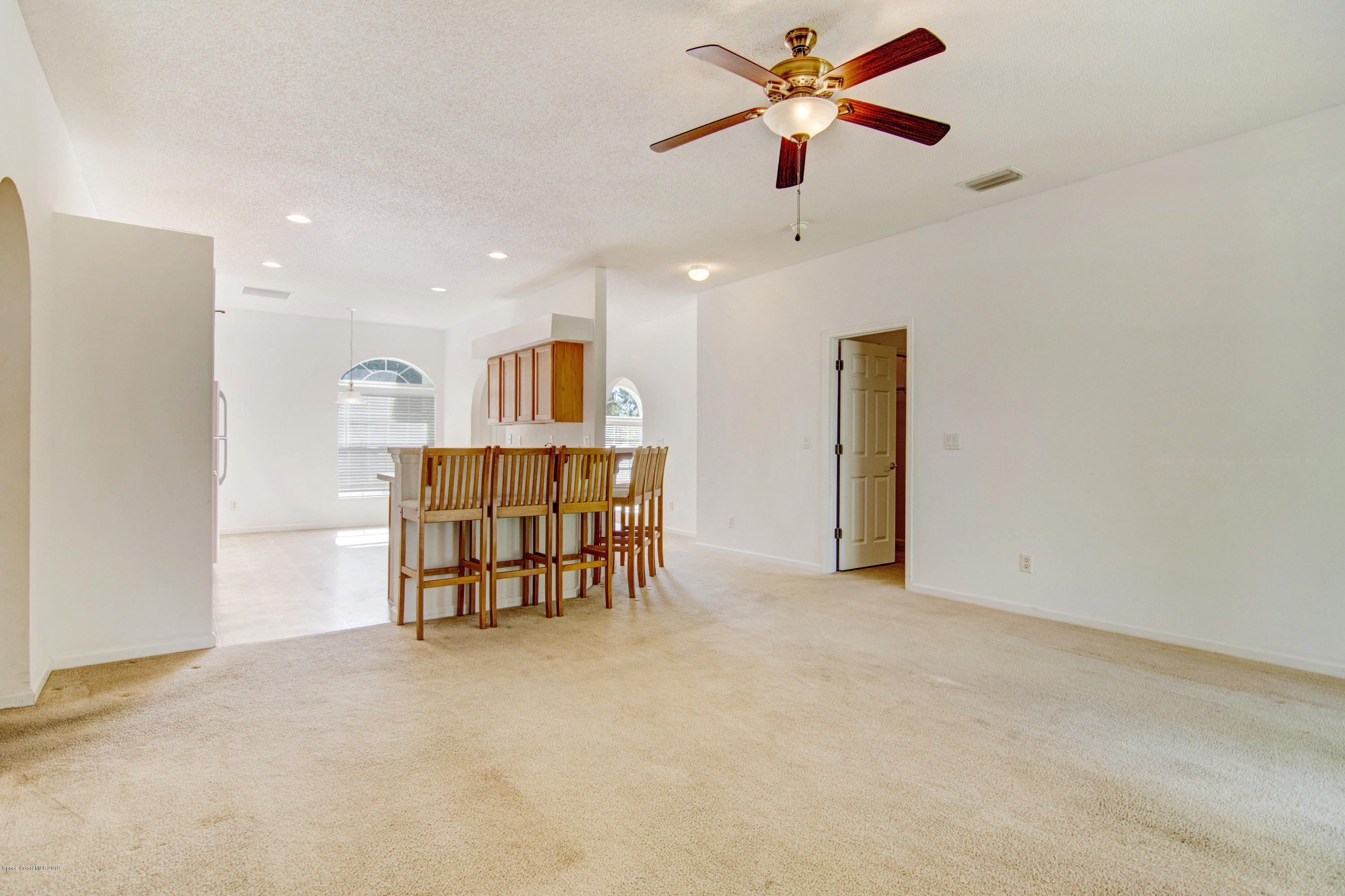 2190 Watkins Road Southeast Palm Bay, FL 32909 - Photo 18 of 29 Facing Kitchen and Breakfast Bar