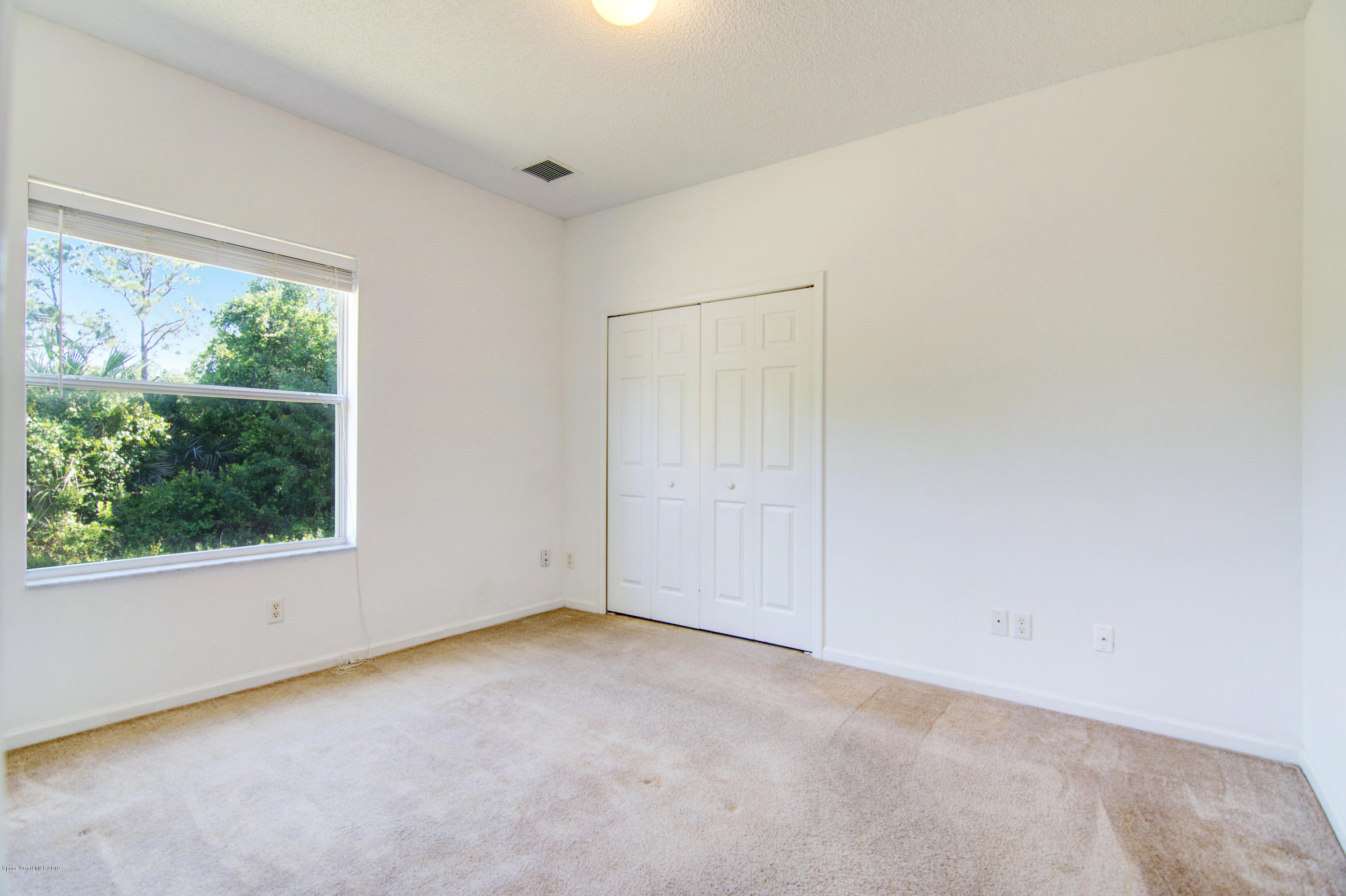 2190 Watkins Road Southeast Palm Bay, FL 32909 - Photo 26 of 29 Second Bedroom