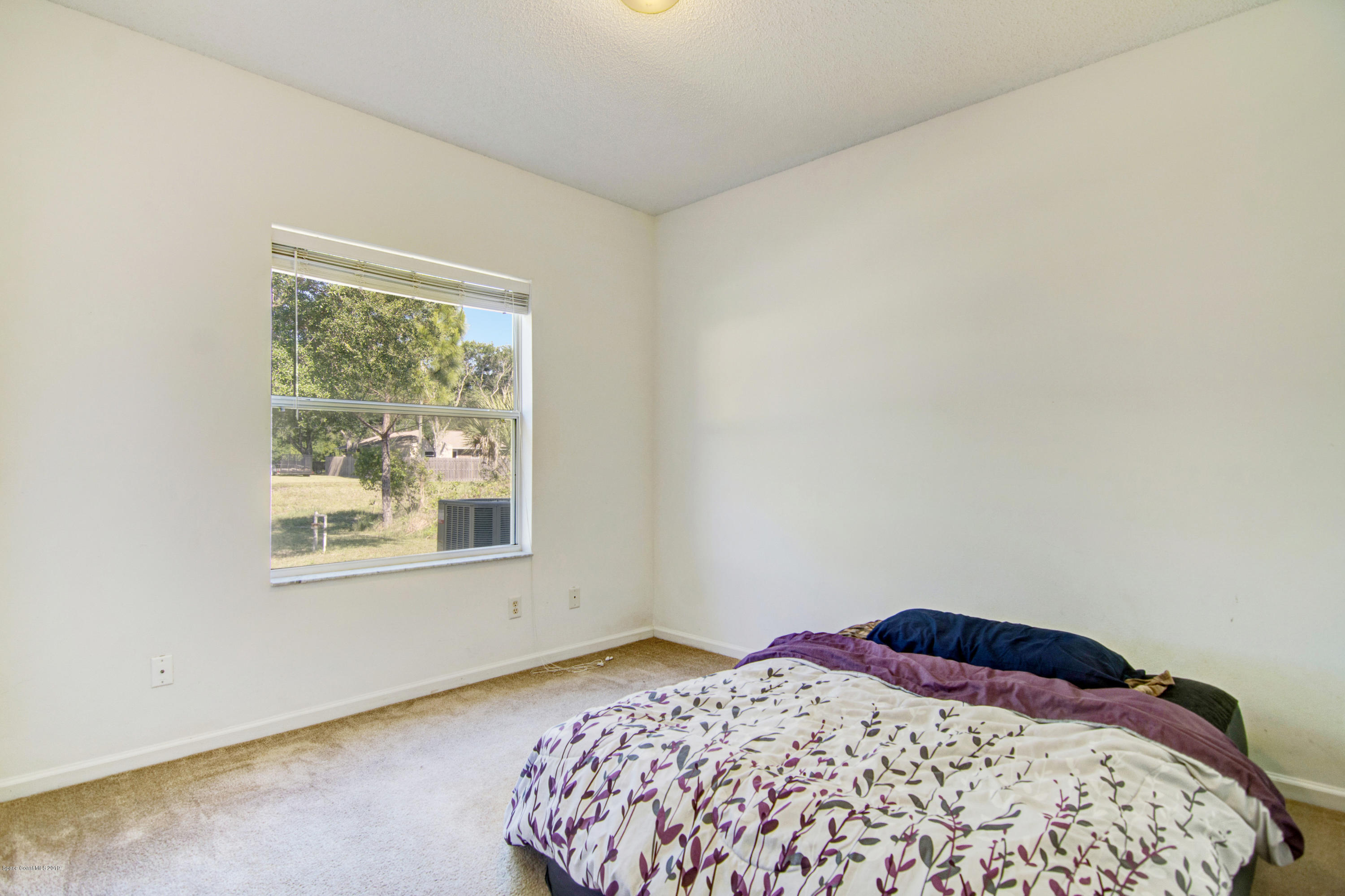 2190 Watkins Road Southeast Palm Bay, FL 32909 - Photo 28 of 29 Third Bedroom