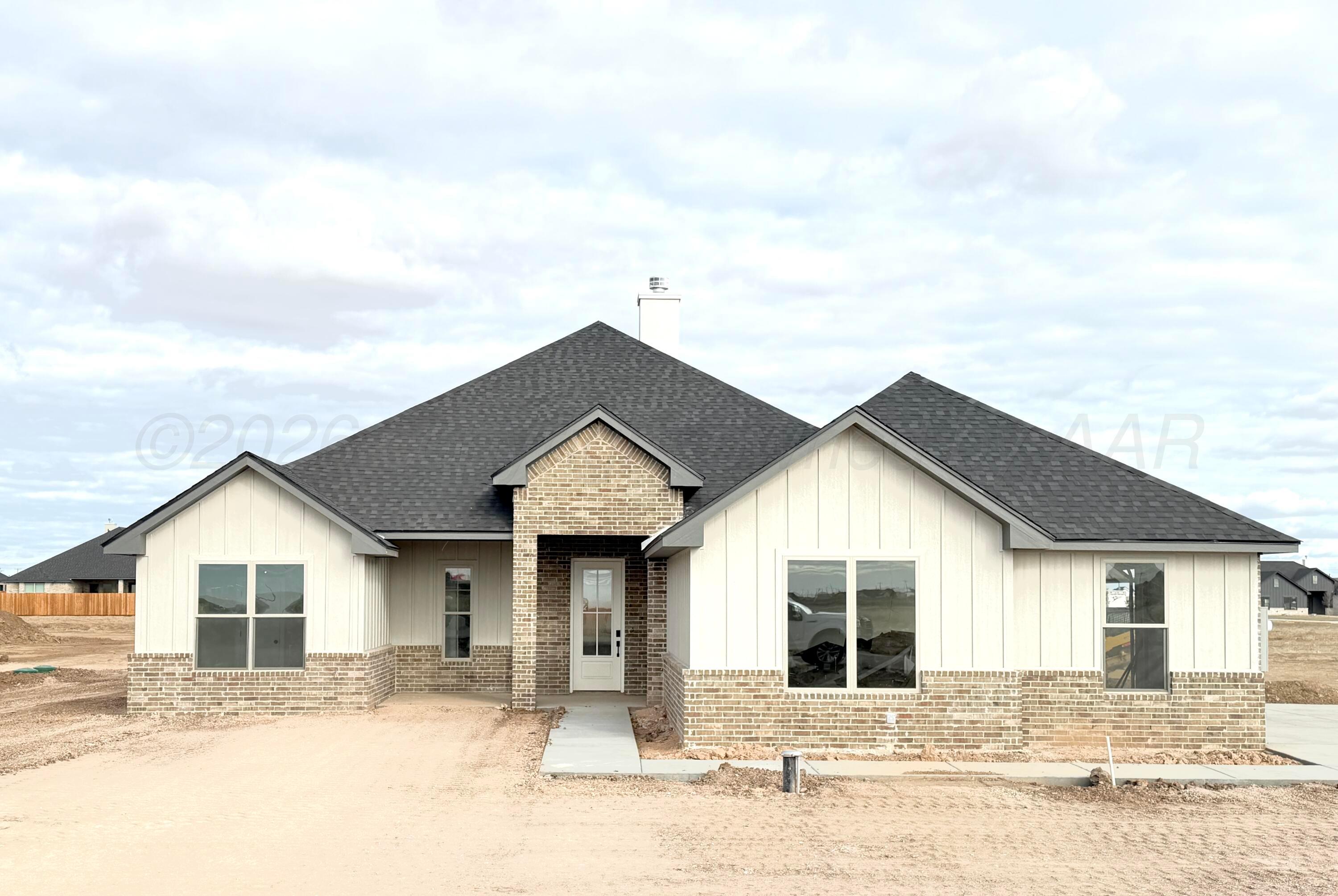 10300 Prickly Pear Road Amarillo, TX 79119 - Photo 1 of 2 front view of a house with a yard