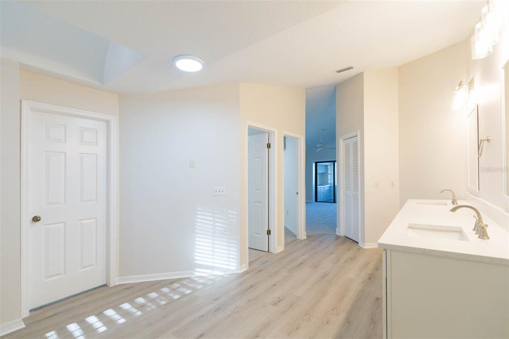 937 Bunker View Drive Apollo Beach, FL 33572 - Photo 17 of 73 a bathroom with a sink and a mirror