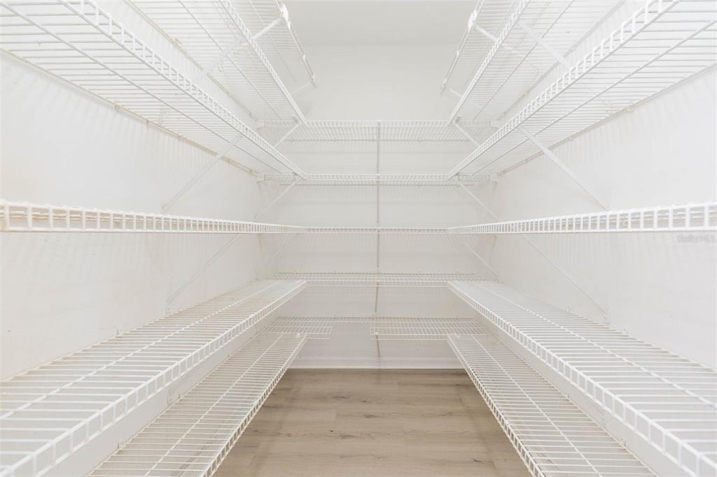 937 Bunker View Drive Apollo Beach, FL 33572 - Photo 26 of 73 a view of a room with racks on the wall