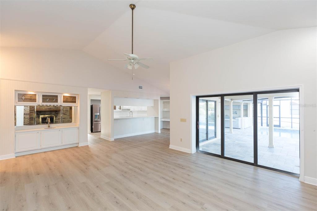 937 Bunker View Drive Apollo Beach, FL 33572 - Photo 30 of 73 a view of an empty room with kitchen and window