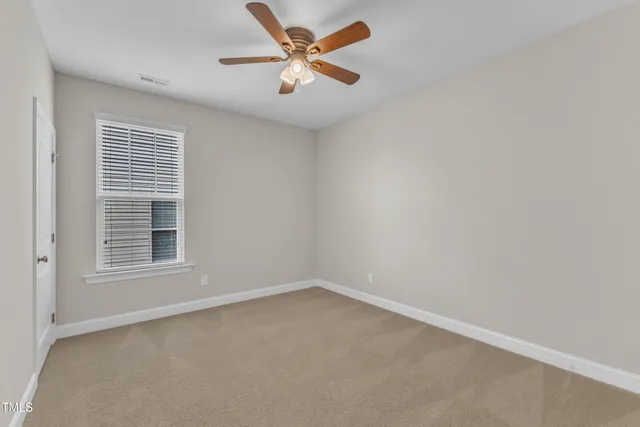 a bathroom with a tub shower and a sink