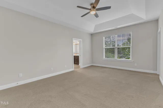 a view of a balcony with wooden floor