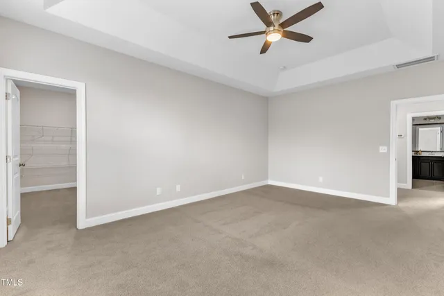 a view of a house with a backyard and a slide