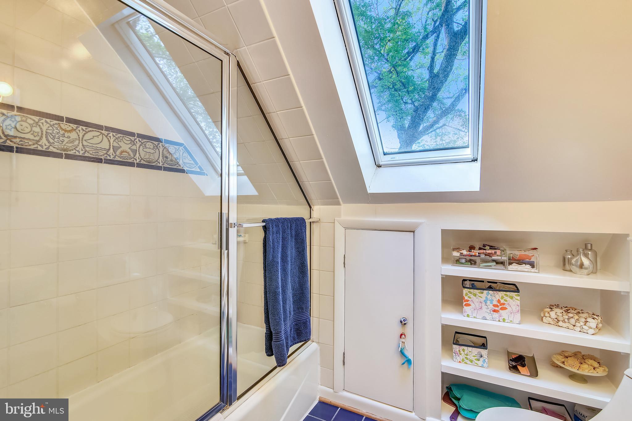 1503 Crest Road Silver Spring, MD 20902 - Photo 28 of 64 Gorgeous Blue Ceramic Tile and Built In Shelving