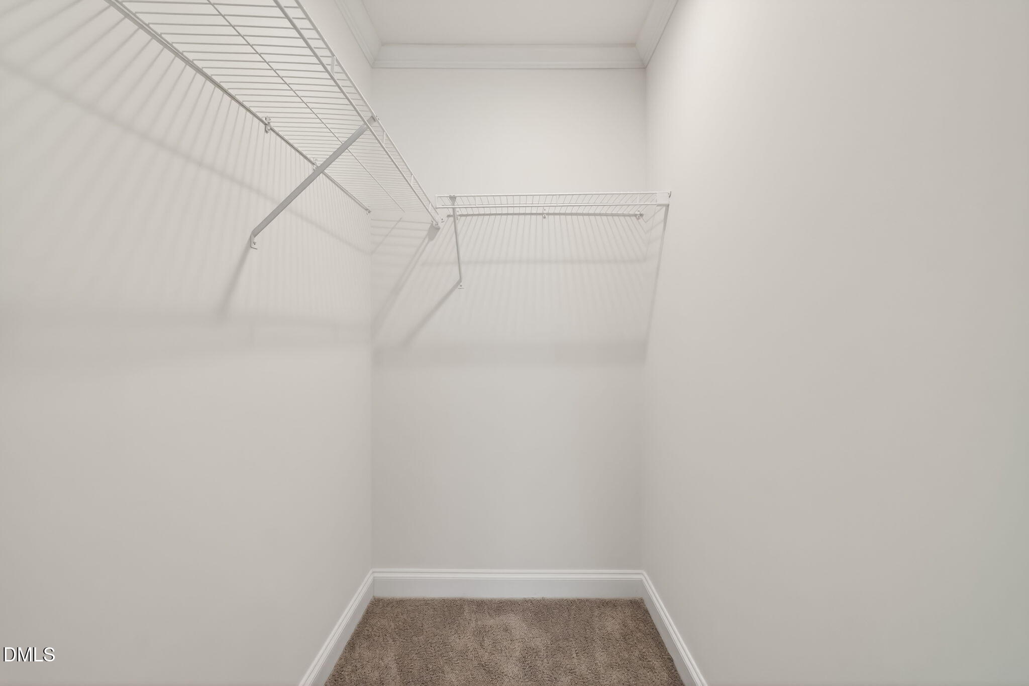 7122 Guess Road Hillsborough, NC 27278 - Photo 43 of 48 a view of a room with racks on the wall