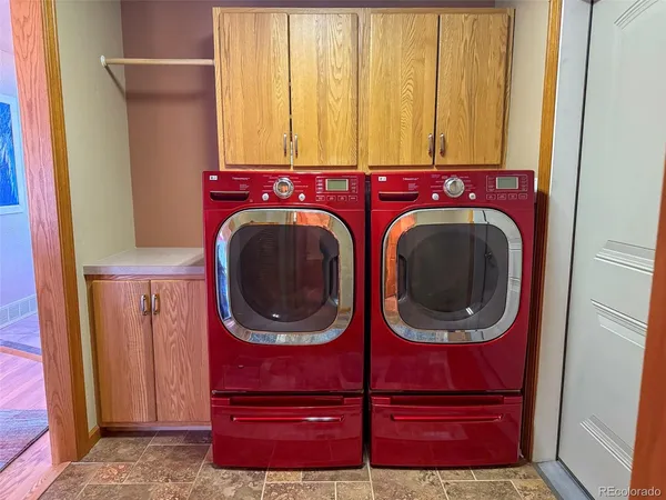 a bathroom with a shower and a sink