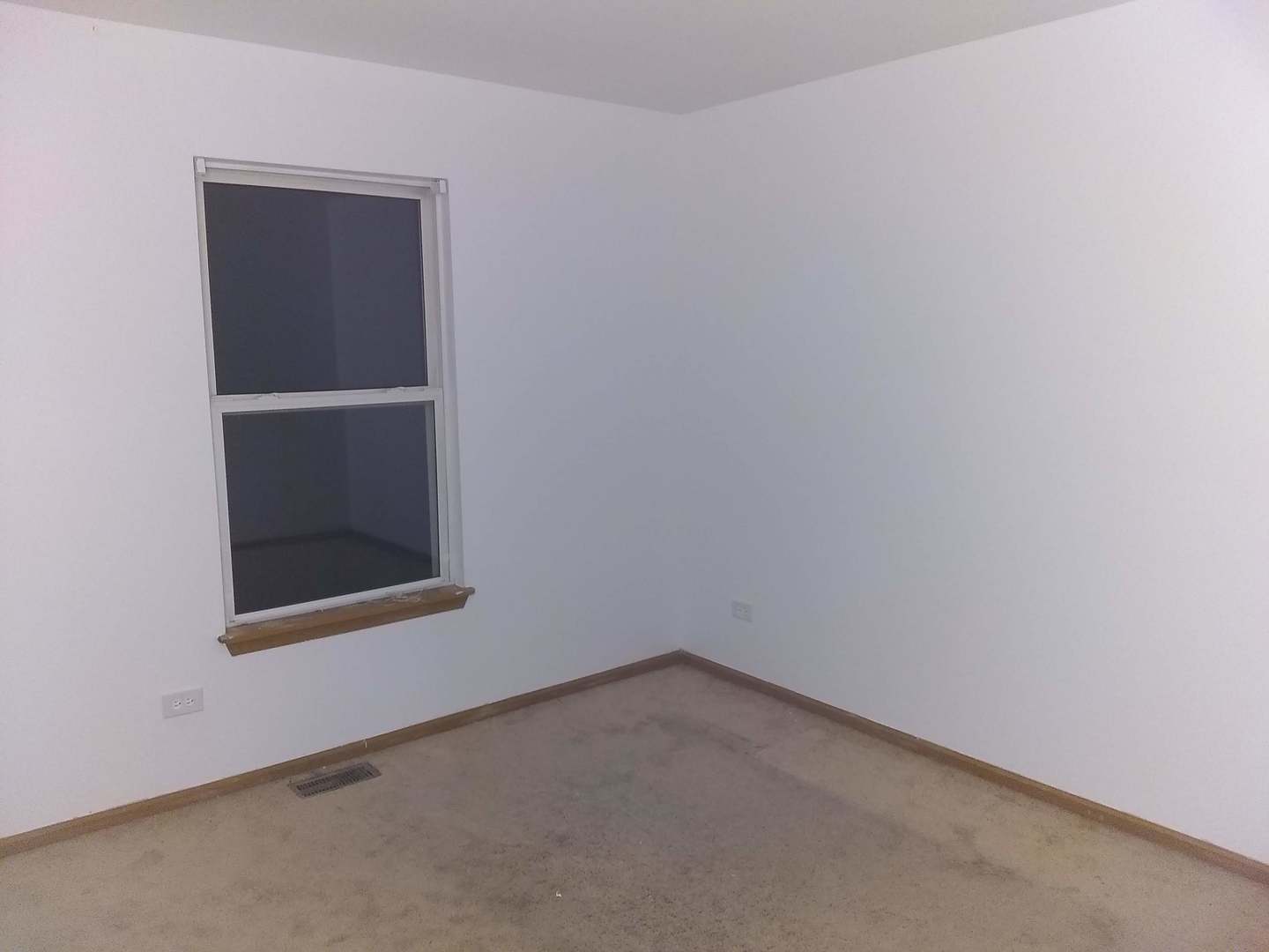 2103 Beldon Court Plainfield, IL 60586 - Photo 11 of 16 an empty room with a window