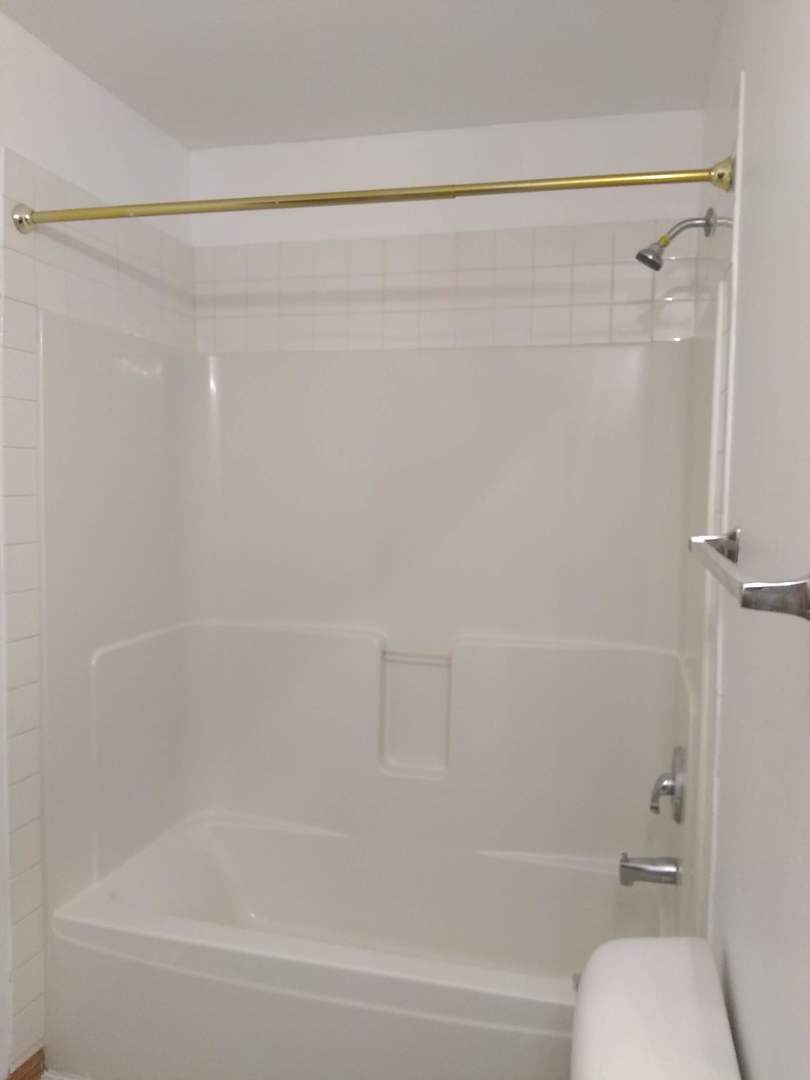2103 Beldon Court Plainfield, IL 60586 - Photo 13 of 16 a bathroom with a shower and a toilet