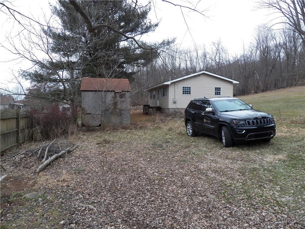 709 Cherry Lane Road Apollo, PA 15613 - Photo 11 of 14 a car parked in front of a house