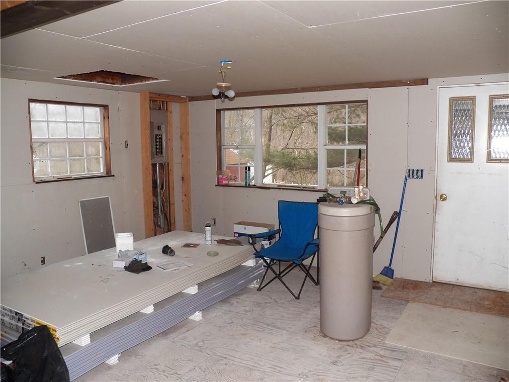 709 Cherry Lane Road Apollo, PA 15613 - Photo 2 of 14 a view of a dining room with furniture window and outside view