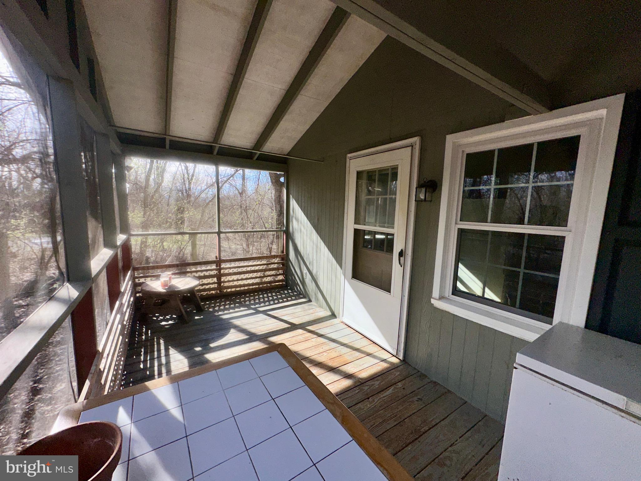 1336 Old Winchester Road Boyce, VA 22620 - Photo 54 of 76 a view of an empty room with a window