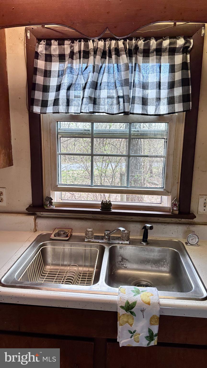 1336 Old Winchester Road Boyce, VA 22620 - Photo 9 of 76 a close view of a sink and dishwasher in a kitchen