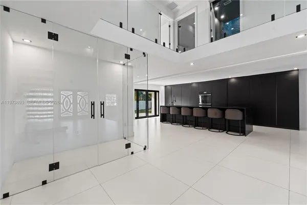 a large bathroom with a large mirror