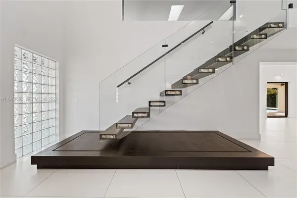 a view of workspace with furniture and window