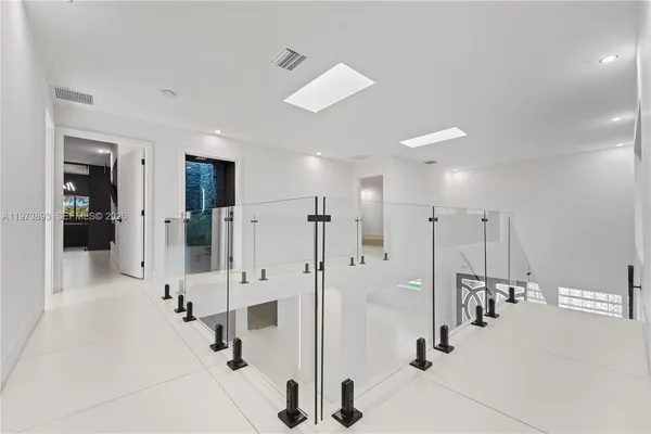 a utility room with sink dryer and washer