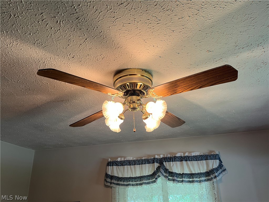 13604 Alexander Road Cleveland, OH 44125 - Photo 24 of 49 Master Bedroom has a textured ceiling and ceiling fan light