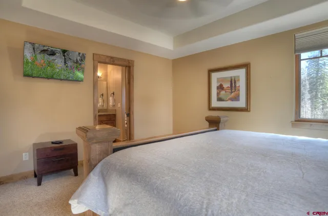 a bathroom with a granite countertop sink mirror and double