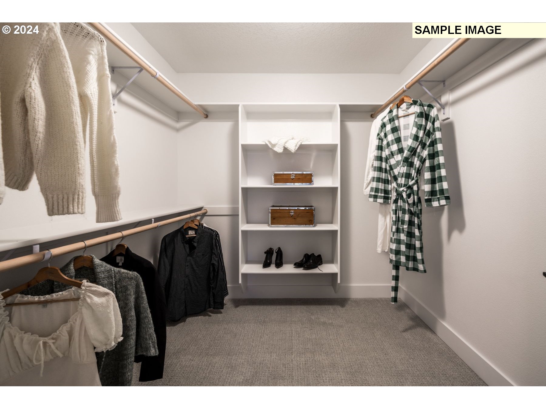 919 Northwest 178th Street Ridgefield, WA 98642 - Photo 13 of 19 a view of walk in closet with clothes and shoes