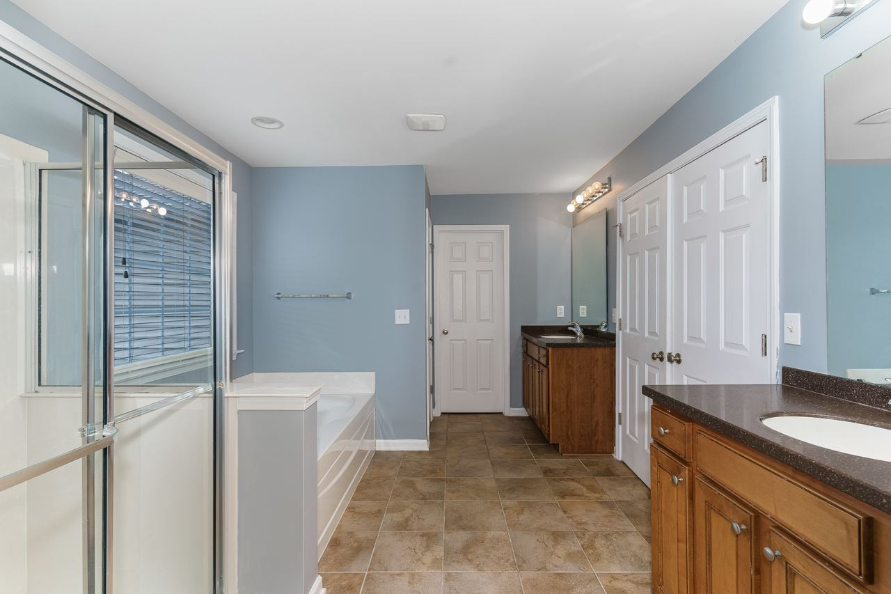 2206 Spacious Skies Street Raleigh, NC 27614 - Photo 28 of 30 Master bath with his/her vanities & W.I.C.