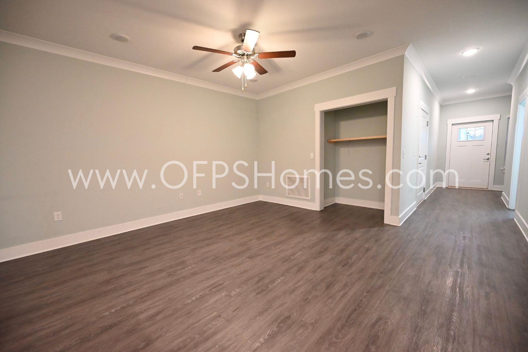 312 North Sand Palm Road Freeport, FL 32439 - Photo 21 of 26 a view of an empty room with wooden floor