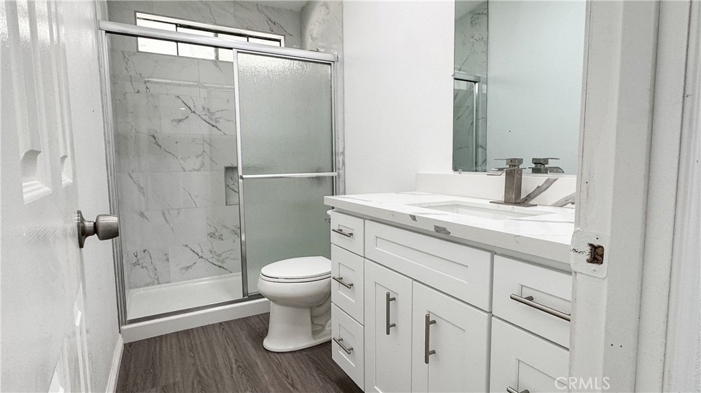 56515 Dickson Way Anza, CA 92539 - Photo 14 of 17 a bathroom with a sink a toilet and shower