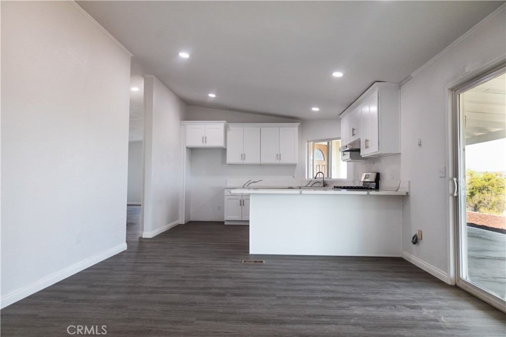 56515 Dickson Way Anza, CA 92539 - Photo 6 of 17 a view of kitchen with wooden floor