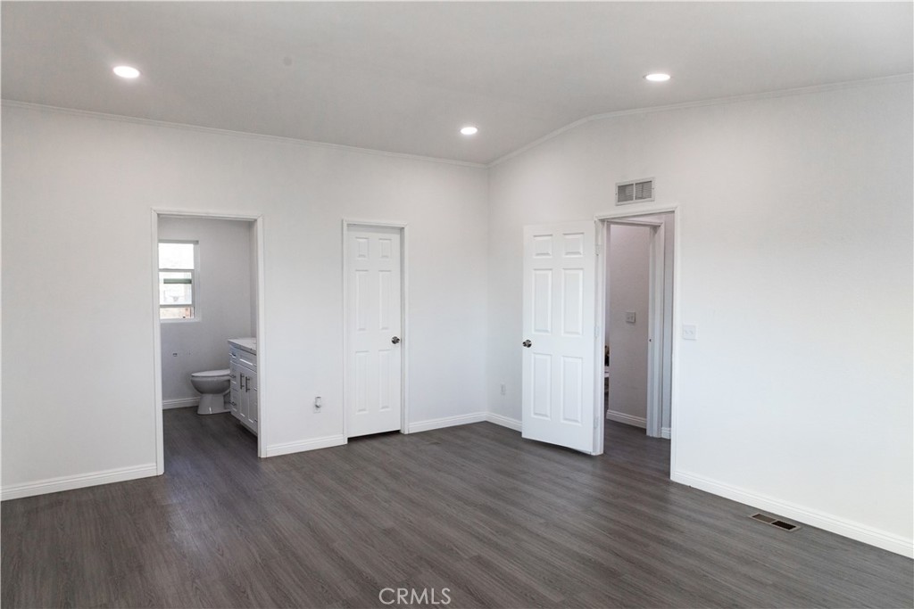 56515 Dickson Way Anza, CA 92539 - Photo 9 of 17 a view of an empty room with wooden floor and closet