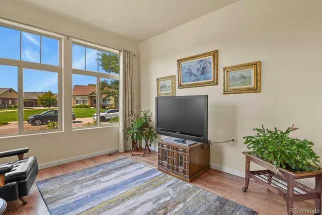 a room with furniture and a flat screen tv