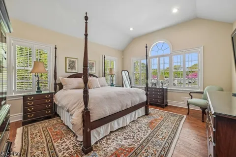 a bed room with a bed and a table