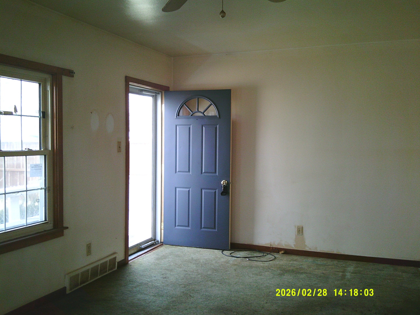 409 McKillop Street Lynn Center, IL 61262 - Photo 2 of 19 an empty room with windows
