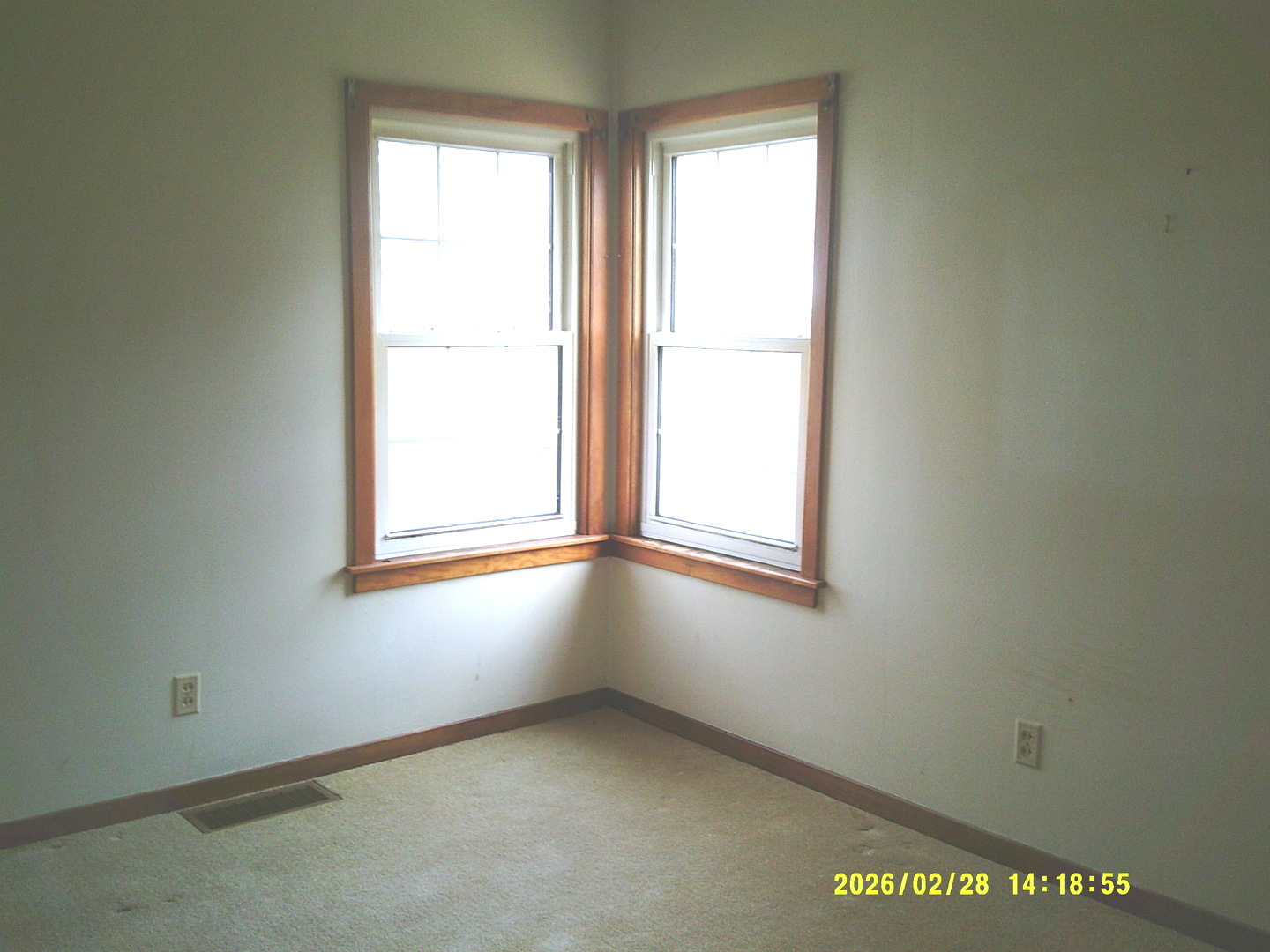 409 McKillop Street Lynn Center, IL 61262 - Photo 4 of 19 an empty room with windows