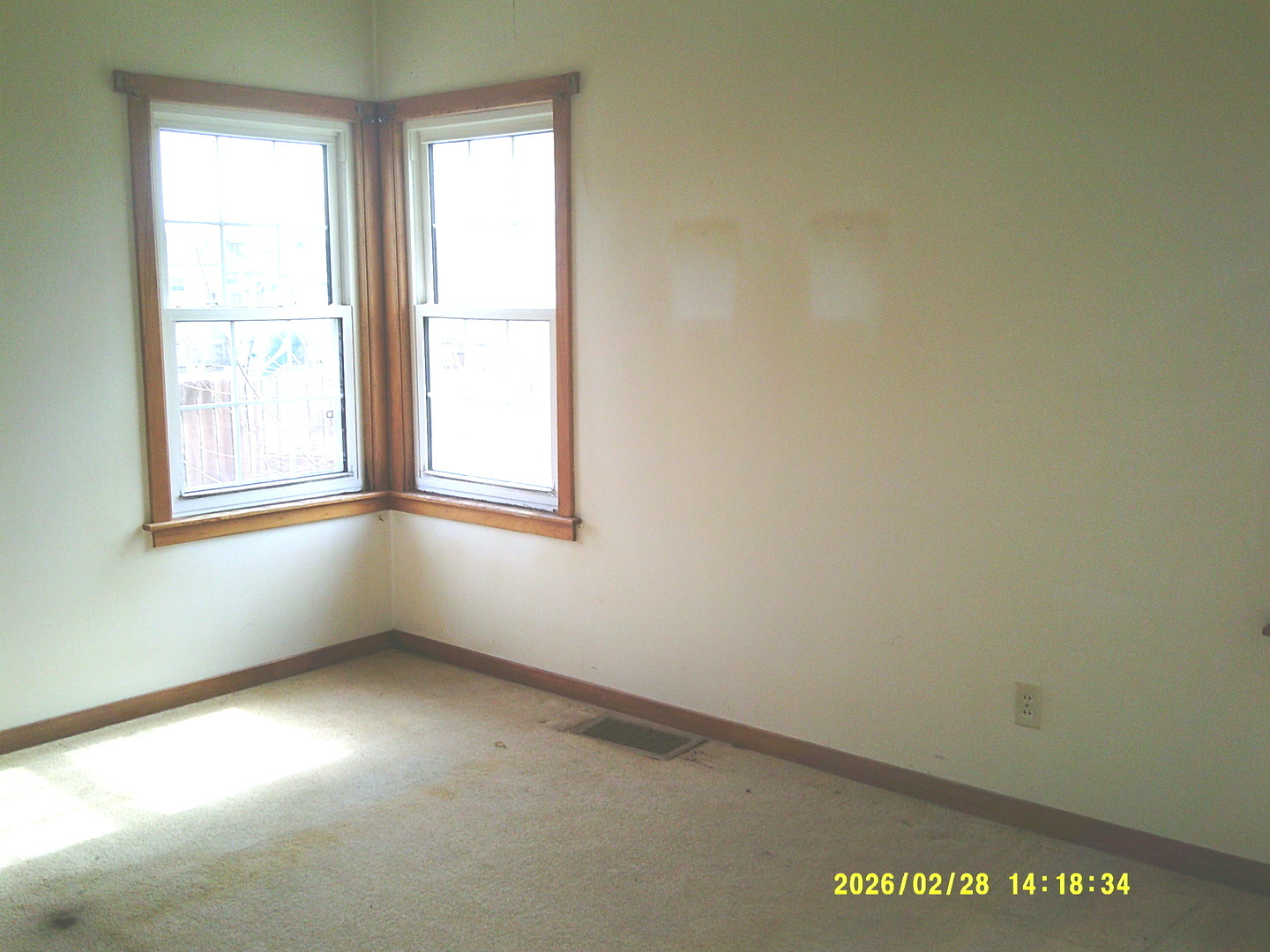 409 McKillop Street Lynn Center, IL 61262 - Photo 8 of 19 an empty room with a window