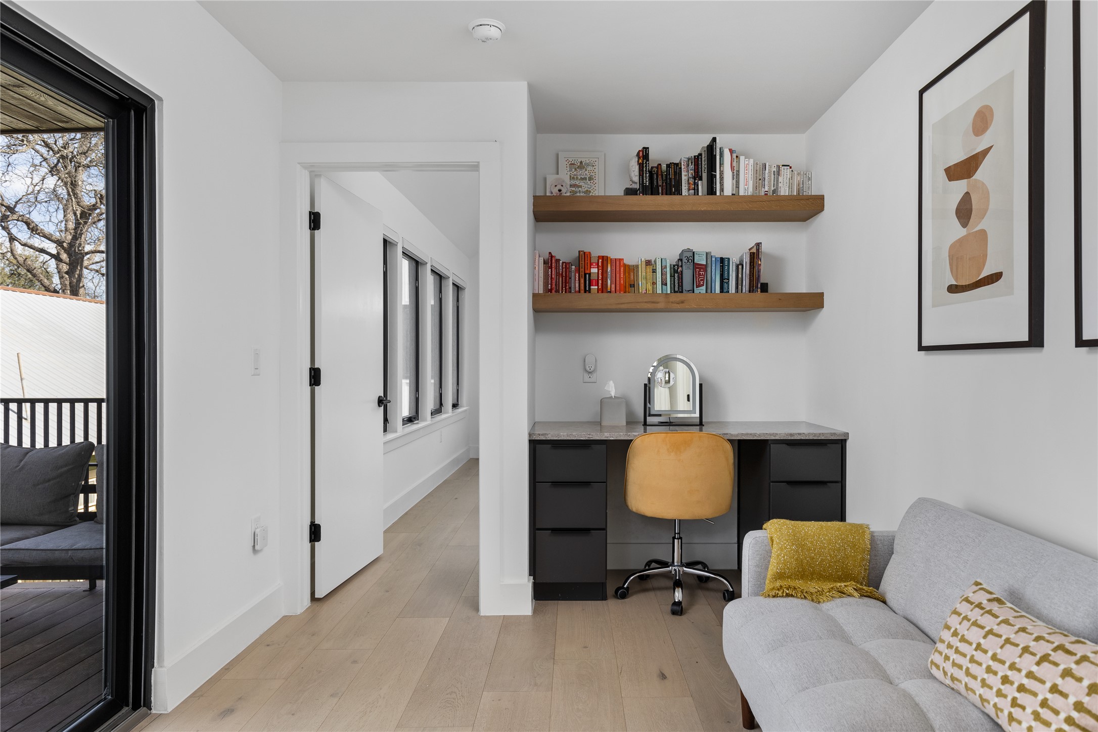 108 Comal Street Austin, TX 78702 - Photo 19 of 40 a workspace with furniture and window